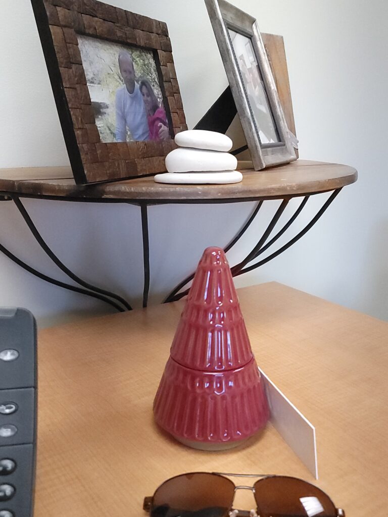 A sample of stones being displayed near a picture frame.